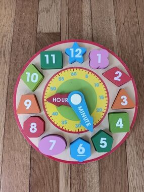 Melissa & Doug Wooden Shape Sorting Learning Clock - Pink, Blue, Green